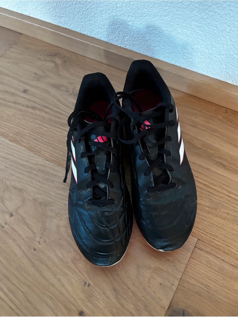 adidas Black Athletic Shoes with White Stripes and Pink Accents